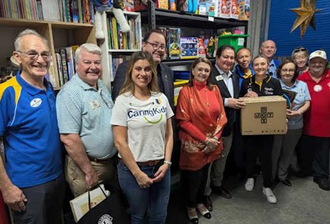 Lions Clubs International President Fabricio Oliveira visiting the CaringKids Workshop